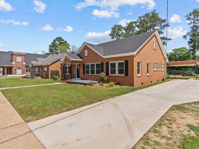 203 E Mckinnon St, New Brockton, AL 36351 - view of front of property with brick siding, concrete driveway, a front lawn, and crawl space