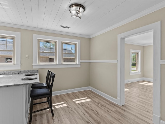 203 E Mckinnon St, New Brockton, AL 36351 - unfurnished office featuring light wood-type flooring, crown molding, and wood ceiling
