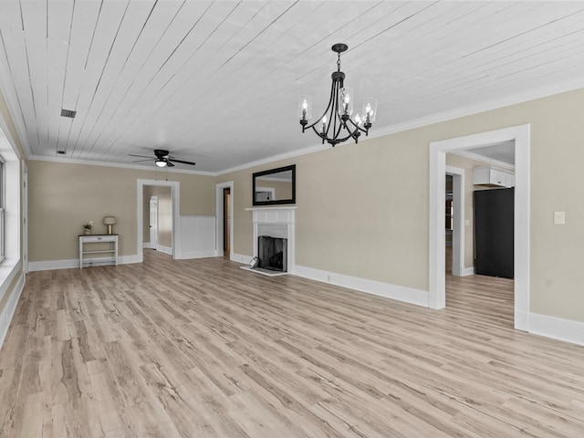 203 E Mckinnon St, New Brockton, AL 36351 - unfurnished living room featuring ceiling fan, ornamental molding, a chandelier, a fireplace, and light wood-style flooring