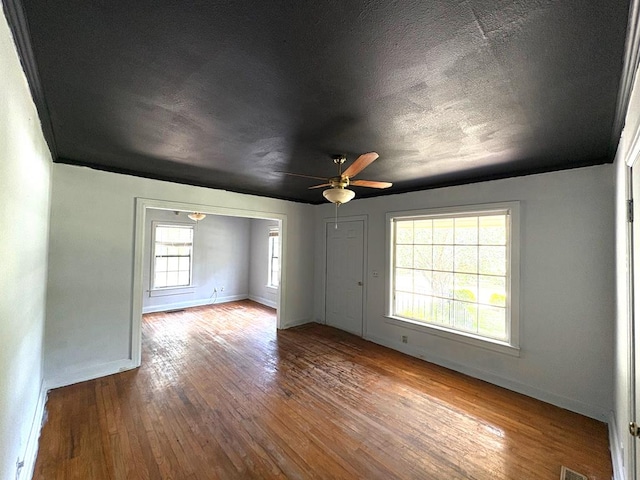 176 Camilla Ave, Ozark, AL 36345 - spare room with hardwood / wood-style floors, baseboards, and ceiling fan
