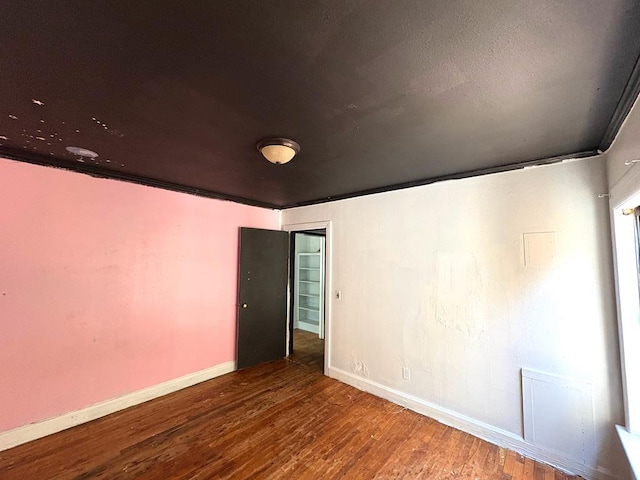 176 Camilla Ave, Ozark, AL 36345 - empty room with wood finished floors and baseboards