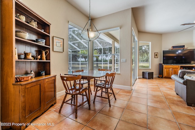 dining area with light tile patterned floors