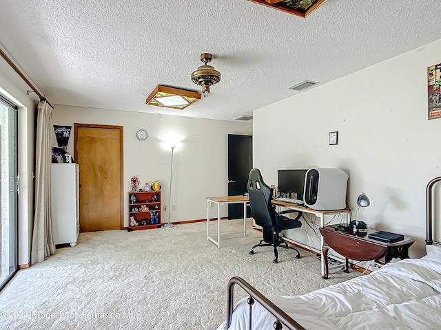 interior space with a textured ceiling