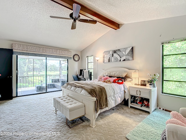 bedroom with multiple windows, access to outside, light carpet, and ceiling fan