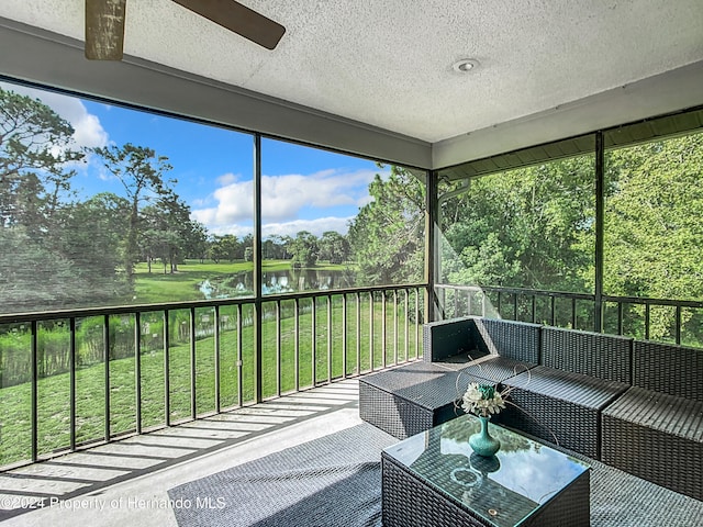 sunroom with a water view