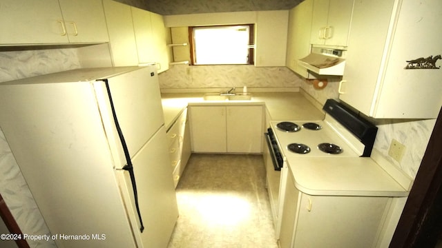 kitchen with sink and white appliances