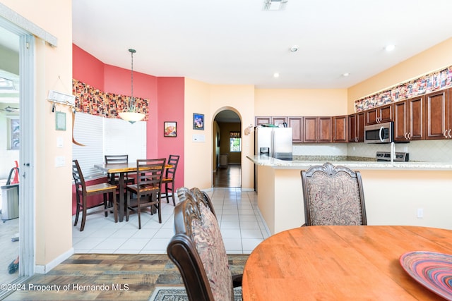 view of tiled dining room