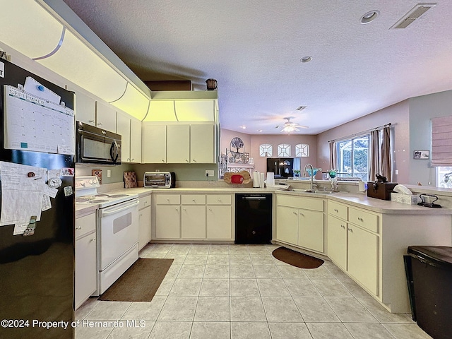 kitchen featuring cream cabinets, kitchen peninsula, black appliances, a textured ceiling, and ceiling fan