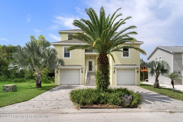 view of front of property featuring a garage