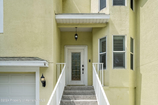 property entrance featuring a garage