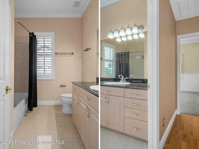 full bathroom featuring toilet, vanity, tile patterned flooring, and ornamental molding