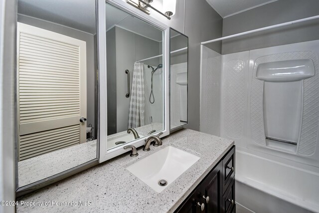 6635 Stewart Ave N, Saint Petersburg, FL 33702 - bathroom with washtub / shower combination and vanity