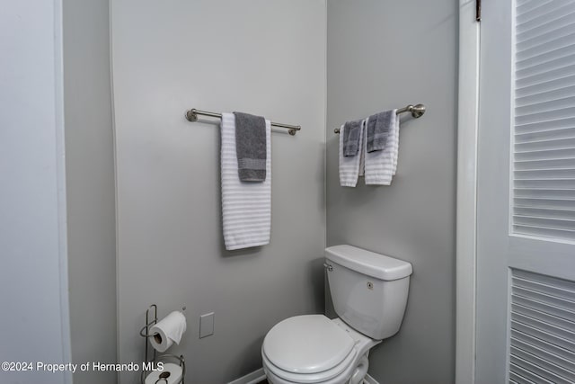 bathroom featuring toilet