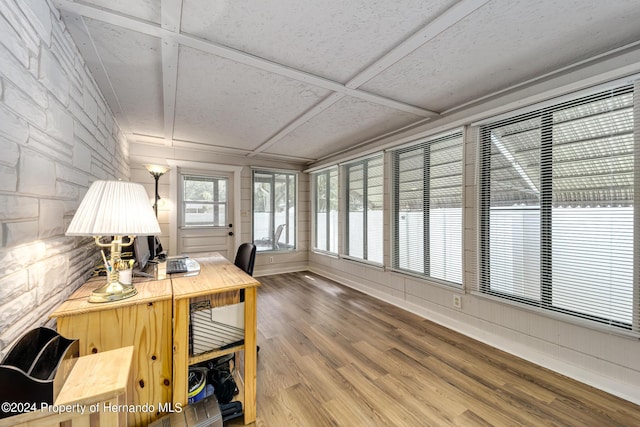 6635 Stewart Ave N, Saint Petersburg, FL 33702 - office area with wood finished floors, coffered ceiling, and baseboards