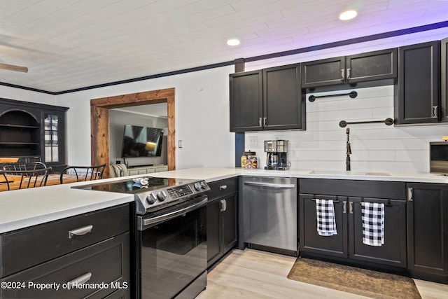 kitchen with sink, crown molding, range with electric stovetop, light wood-type flooring, and dishwasher