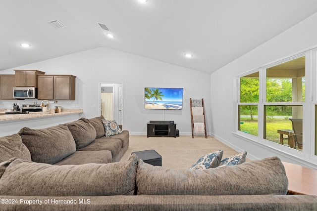 living room with light carpet and lofted ceiling