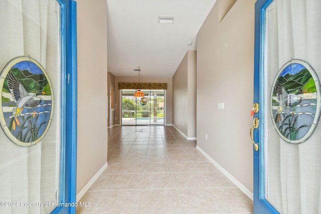 interior space with light tile patterned flooring