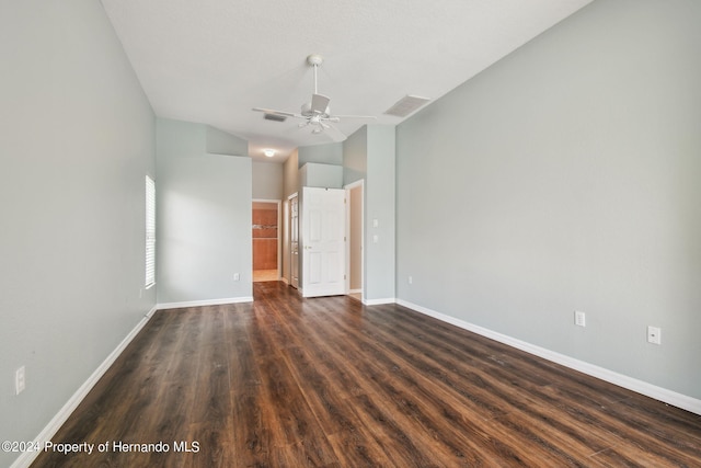 unfurnished bedroom with dark wood-type flooring and ceiling fan