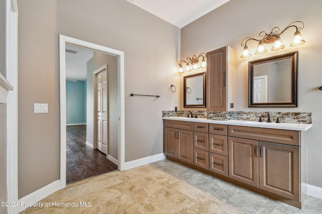 bathroom featuring hardwood / wood-style flooring and vanity