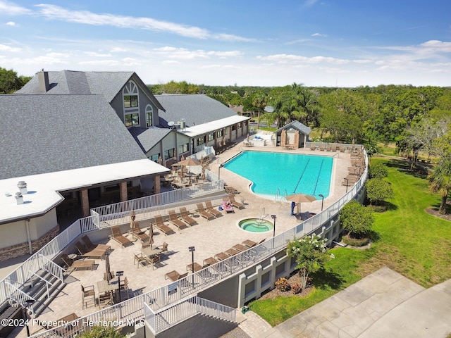 view of swimming pool with a patio