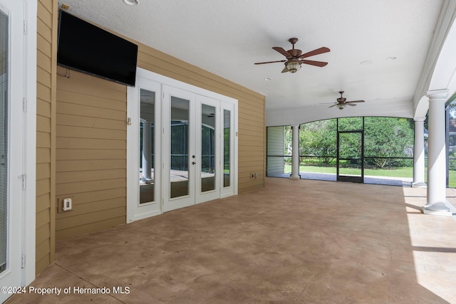 exterior space with ceiling fan and french doors