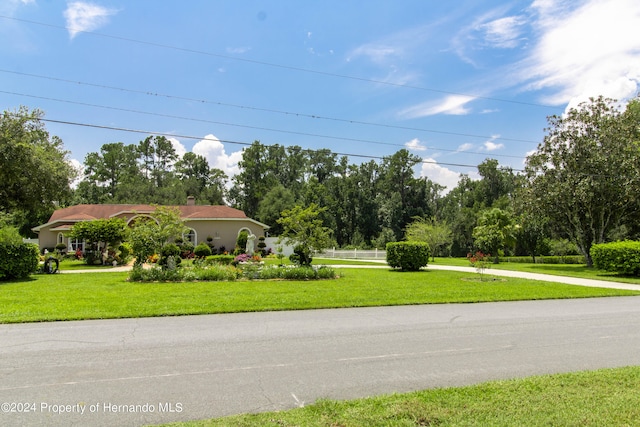 exterior space with a front yard