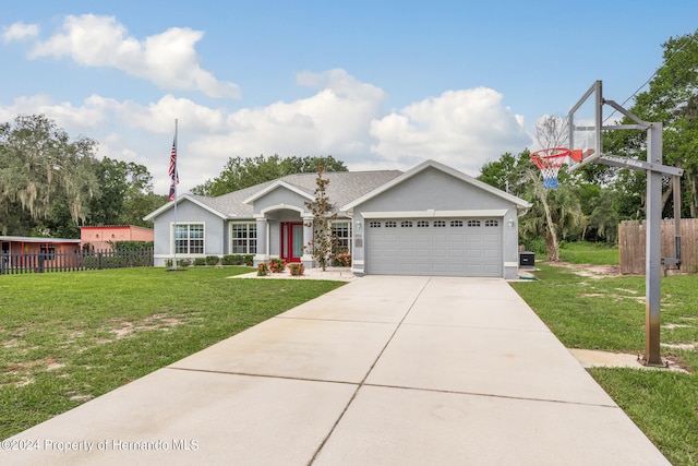 ranch-style house with a front lawn and a garage