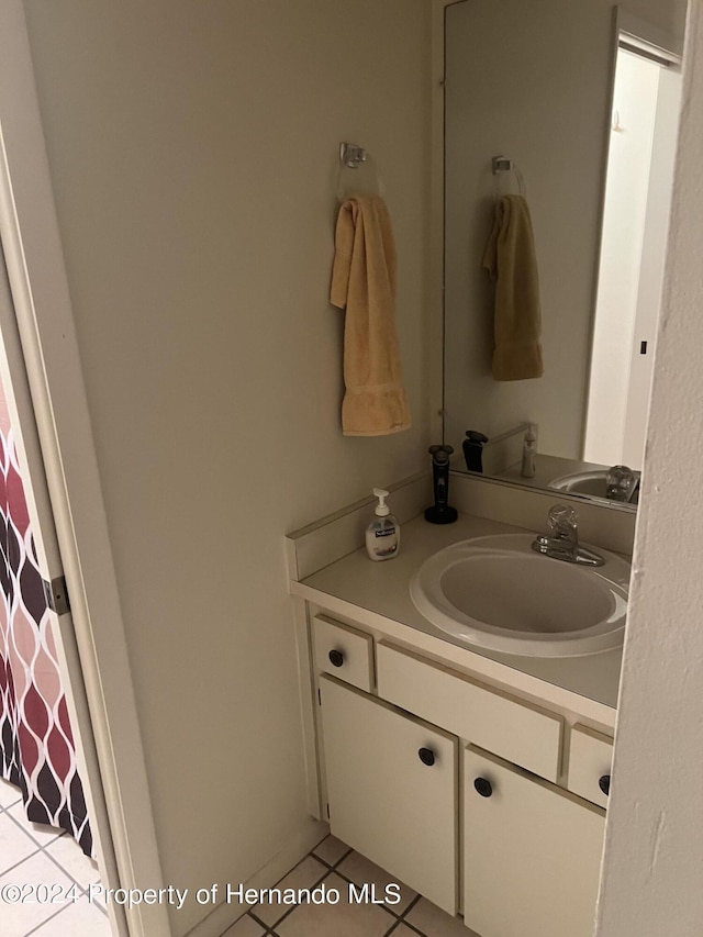 bathroom with vanity and tile patterned floors