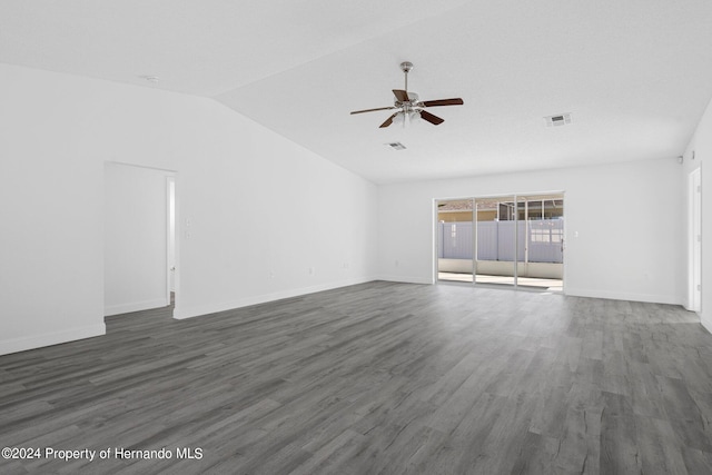 unfurnished living room featuring lofted ceiling, dark hardwood / wood-style floors, and ceiling fan