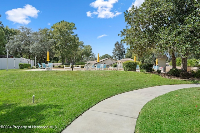 view of home's community featuring a yard