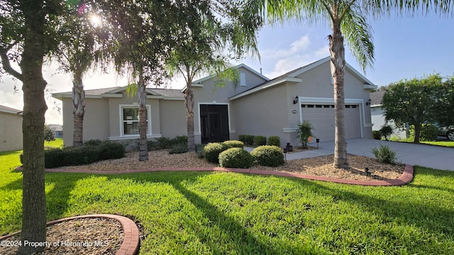 single story home featuring a garage and a front lawn