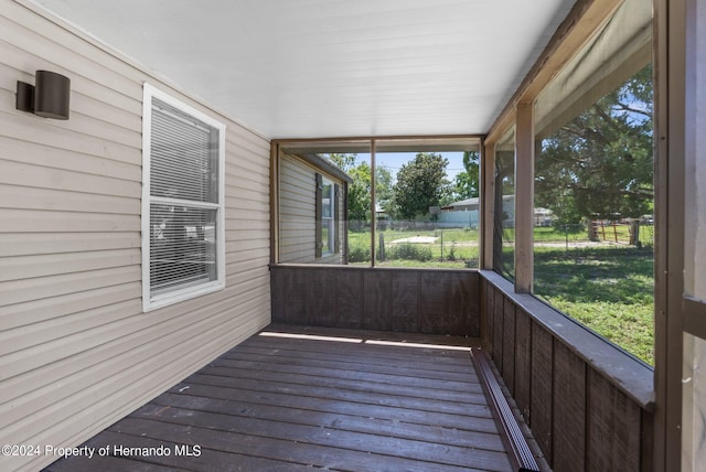 unfurnished sunroom with a healthy amount of sunlight