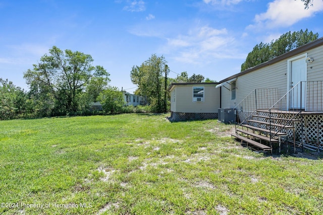 view of yard featuring cooling unit