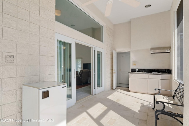 view of patio / terrace featuring ceiling fan