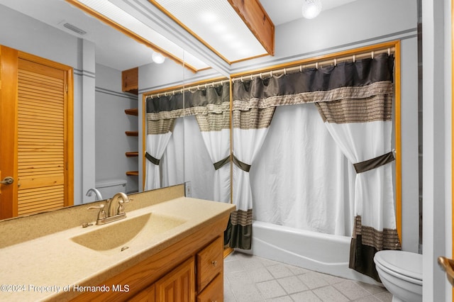 bathroom featuring toilet, visible vents, shower / bath combination with curtain, and vanity