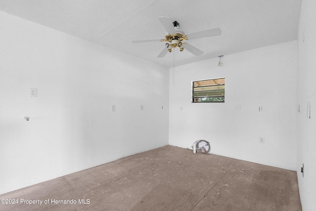 spare room with a ceiling fan