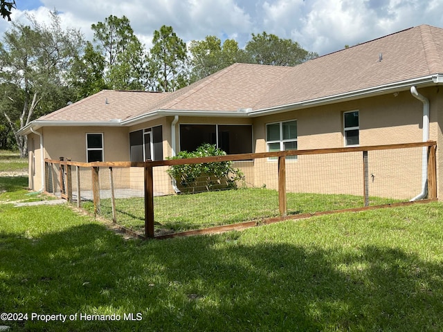 view of property exterior featuring a yard