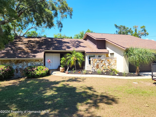 view of front of home with a front yard