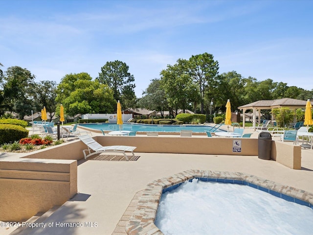 view of pool with a patio area