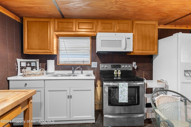 kitchen with white cabinets, sink, white appliances, and wooden ceiling