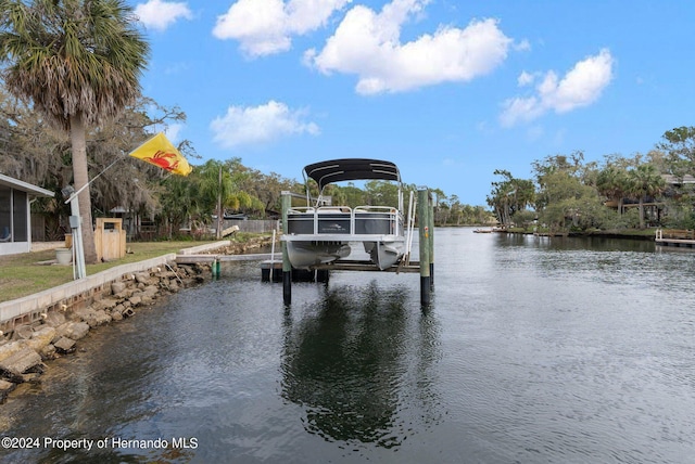 dock area featuring a water view