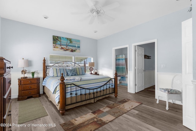 bedroom featuring hardwood / wood-style flooring and ceiling fan