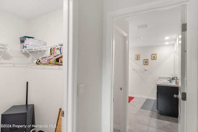 bathroom featuring vanity and tile patterned floors