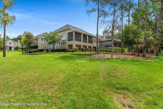 view of yard with a sunroom