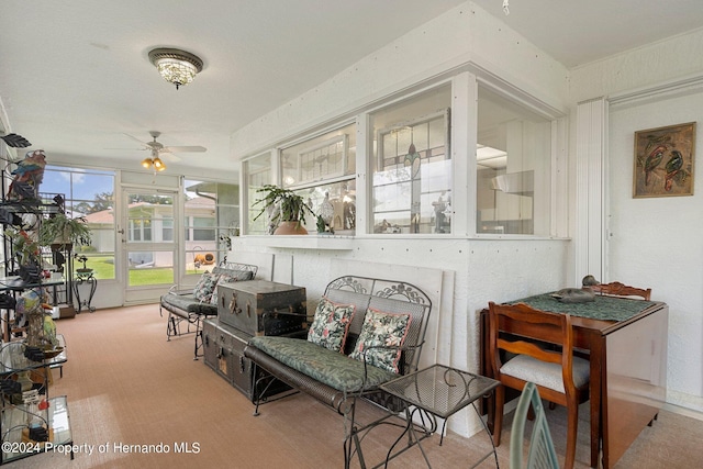 sunroom / solarium with ceiling fan