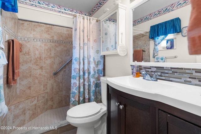 3391 Lambert Ave, Spring Hill, FL 34608 - bathroom with curtained shower, vanity, toilet, and backsplash