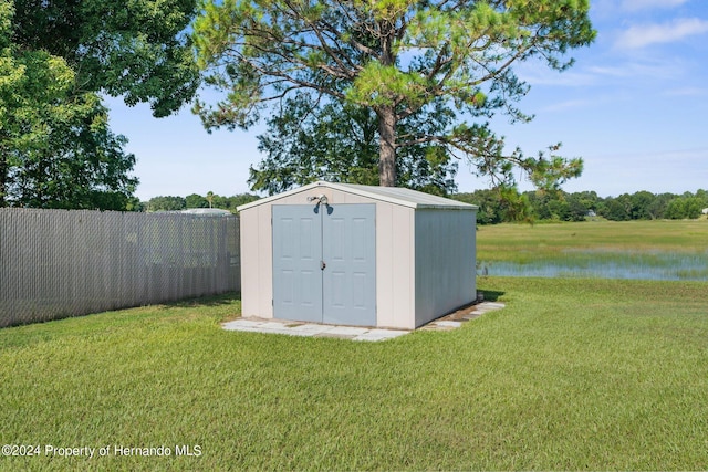 3391 Lambert Ave, Spring Hill, FL 34608 - view of outdoor structure featuring a lawn and a water view