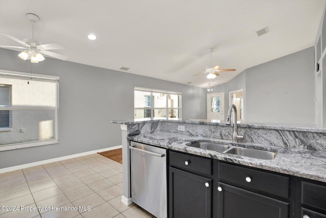 kitchen featuring dishwasher, vaulted ceiling, ceiling fan, and sink