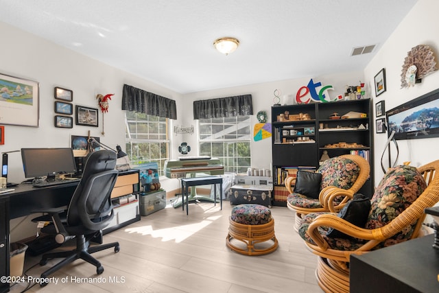 office featuring light hardwood / wood-style floors