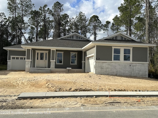 view of front of house with a garage